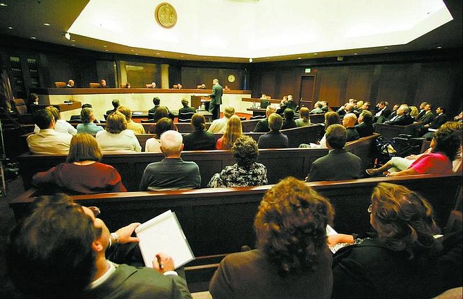 Brad Horn/Nevada Appeal The Nevada Supreme Court listens to Kirk Lenhard speak during arguments concerning the anti-smoking petition at the Nevada Supreme Court on Wednesday in Carson City.