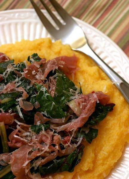 Larry Crowe/Associated Press This recipe for Prosciutto Polenta features time-saving instant polenta mixed with chicken broth instead of water, as well as the conventional Parmesan cheese. The polenta is topped with a saute of prosciutto and chard, and the dish is ready in about 15 minutes.
