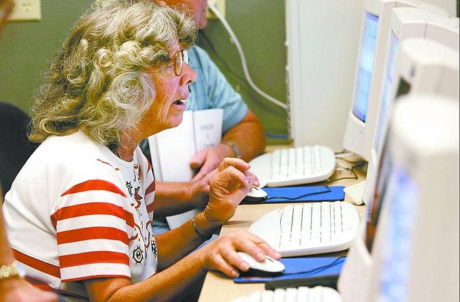 Josephine Wyandt learns about search engines during a computer class at the Carson City Senior Citizen&#039;s Center on Wednesday morning.   Cathleen Allison/ Nevada Appeal