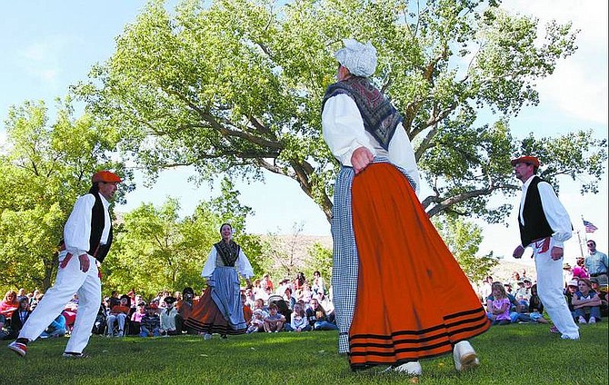 Members of the Zenbat Gara traditional Basque dance troupe provide a cultural performance to an eager group of spectators at the St. Teresa&#039;s Basque Festival at Fuji Park. This year&#039;s festival will be Sunday.    Brian Sokol/ Nevada Appeal