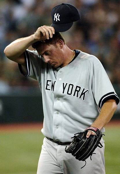 New York Yankees pitcher Darrell Rasner walks to the dugout after the fourth inning of play against the Toronto Blue Jays in Toronto Monday, Sept. 18, 2006. (AP PHOTO/CP, Aaron Harris)