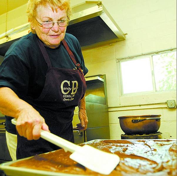 Shannon Litz/Nevada Appeal news service Marian Vassar spreads fudge on the first day of candymaking in Genoa on Aug. 14, 2005, in preparation for the annual Candy Dance.
