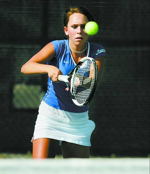BRAD HORN/Nevada Appeal Carson&#039;s Christa Casci, 16, returns a serve against her Reno High School opponent at Carson High School on Thursday.