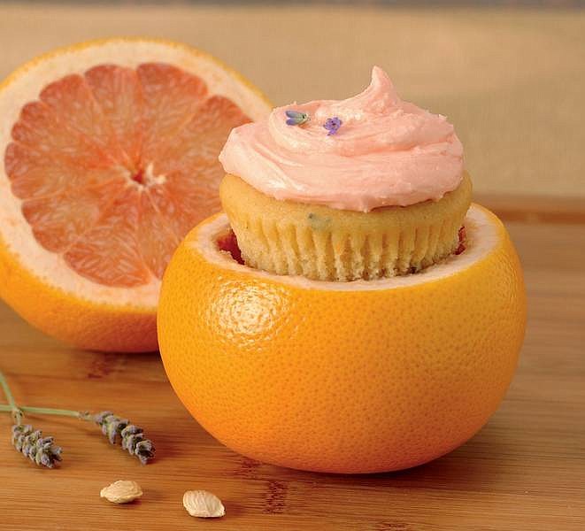 National Honey Board Lavender Pink Grapefruit Cupcakes are topped with Pink Grapefruit Buttercream Frosting.  These lavender-grapefruit cupcakes have just a hint of tangy grapefruit and a lightly lavender-flecked dough.