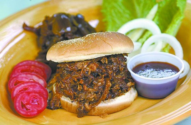Cathleen Allison/Nevada Appeal Molly Gingell&#039;s barbecued pulled pork in root beer.