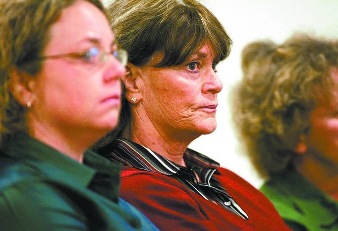 Cathleen Allison/Nevada Appeal Shannon Harris, left, and her mother, Linda Bratton, listen Friday morning as the man suspected of murdering Bratton&#039;s teenage daughter 24 years ago is arraigned. David Winfield Mitchell was extradited back to the U.S. on Thursday. Friday&#039;s hearing was his first appearance in court on a charge of open murder in the killing of Sheila Jo Harris, 18.