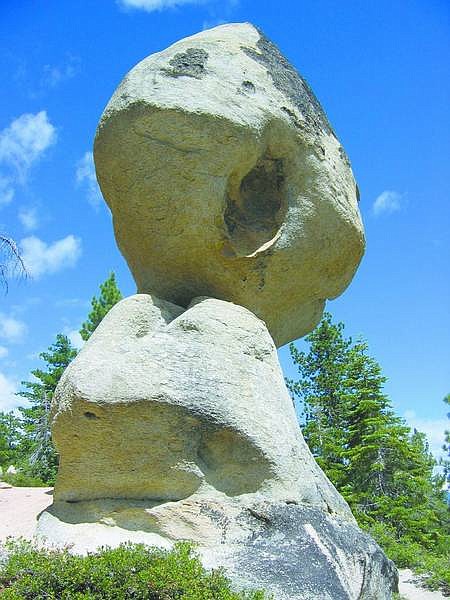 Richard Moreno/Nevada Appeal Visitors to the D.L. Bliss State Park at Lake Tahoe will find the aptly named Balancing Rock, a 130-ton, nose-shaped boulder perched atop another rock.