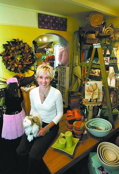 Cathleen Allison/Nevada Appeal Owner Jody Branson shows off the variety of items in her Fresh Ideas shop in Gardnerville on Wednesday.