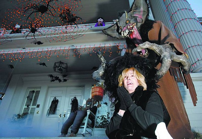 Chad Lundquist/Nevada Appeal Dema Guinn, Nevada&#039;s first lady, poses with some of the spooky decorations Monday at the Governor&#039;s Mansion. Guinn said she gets into the spirit of Halloween for the children&#039;s enjoyment. This is the Guinn&#039;s last year at the Governor&#039;s Mansion and Dema hopes the next first lady or first man will continue the tradition.
