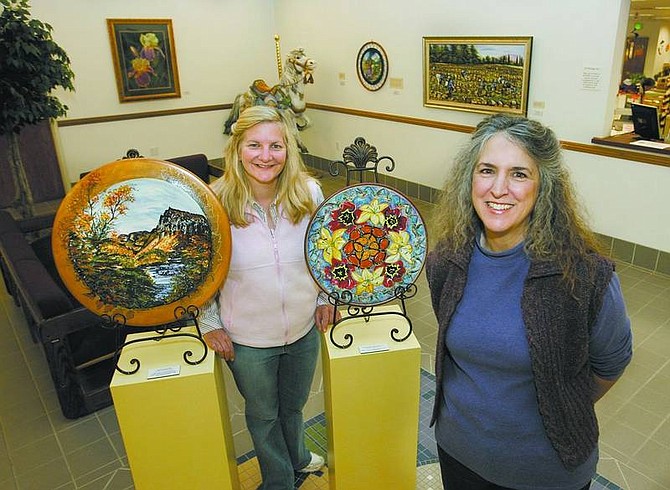 Cathleen Allison/Nevada Appeal Artists Mary Kropelnicki, left, and Pamella Nesbit are two of the artists featured at the &quot;Four Women Artists&quot; art exhibit at the Lyon County Administration Complex in Yerington. The exhibit will be on display until Nov. 20.