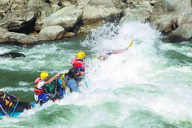Rick Gunn&#039;s raft-mates go it without him down one of the rapids on the Sun Khosi.
