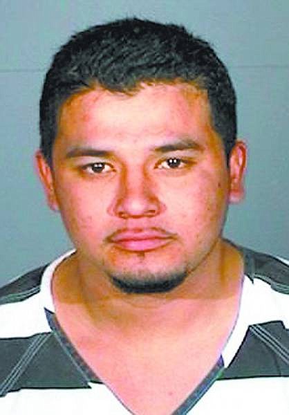Christian Perez-Bravo, 21, was arrested Tuesday on suspicion of felony trafficking after police allegedly found methamphetamine in a teddy bear in the backseat of his SUV at Carson High School.