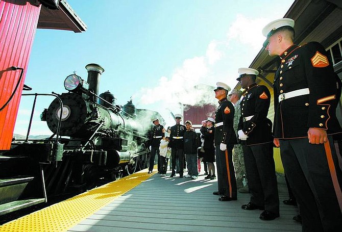 BRAD HORN/Nevada Appeal U.S. Marines from the Marine Corps Mountain Warfare Training Center in Bridgeport, Calif., wait for a train ride with their families at the Nevada State Railroad Museum on the opening day of the Toys for Tots toy drive on Friday.