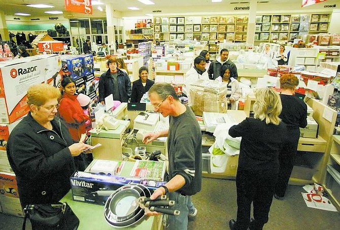 BRAD HORN/Nevada Appeal Bargain shoppers get an early start on their holiday shopping on Black Friday at Gottschalks in Carson City. Police say shoppers should take only one credit/debit card, if possible and not large amounts of cash, a checkbook or a large handbag to help keep themselves safe while shopping.