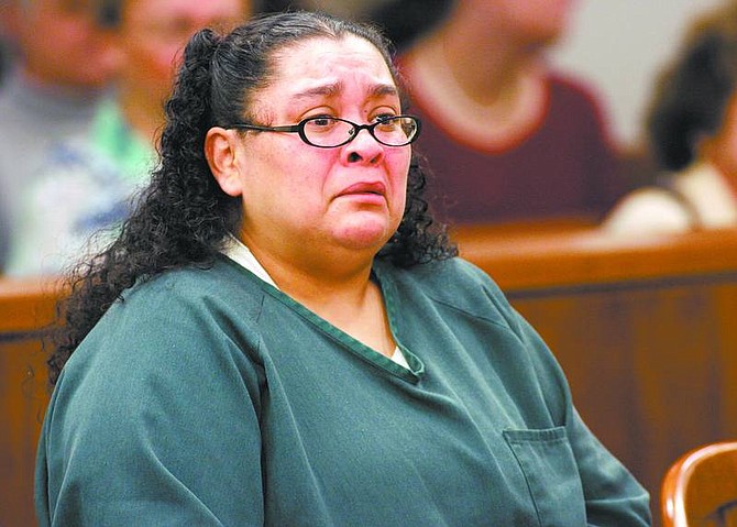 Cathleen Allison/Nevada AppealRegina Rios reacts as one of her children testifies in court Wednesday. Rios received a maximum sentence of 22-55 years for felony child abuse and false-imprisonment charges after locking two of her children in a bathroom for years.