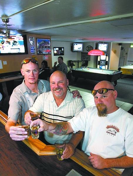 Cathleen Allison/Nevada Appeal Bruce Sellars, center, and his sons Bruce, left, and Mike have opened Toads Bar at William and Stewart streets.