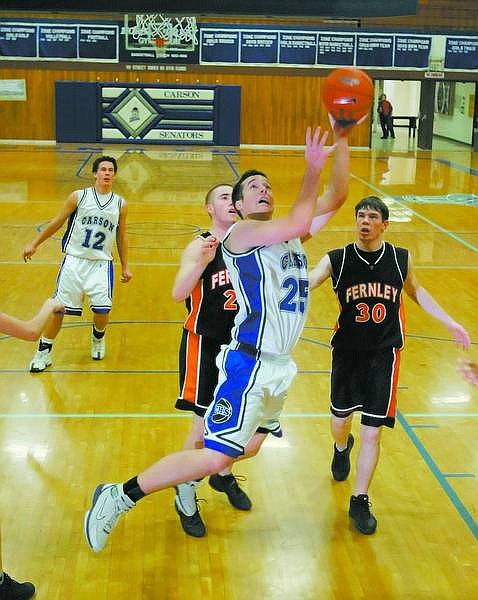 BRAD HORN/Nevada Appeal Carson&#039;s Rob Valerius drives to the basket against Fernley during the Carson Classic on Thursday.