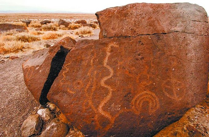 Keith Sheffield/Nevada Appeal News Service Rock art found at Grimes Point often bears markings that are difficult to interpret. Another piece of rock art shows a different design, below left.