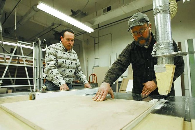 Ken Cavin, left, and his brother Tom Cavin, of Cavin&#039;s Woodcrafts, work in their shop.      Chad Lundquist/ Nevada Appeal