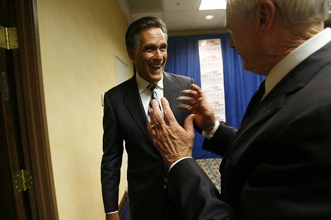 AP Photo/Isaac BrekkenFormer Nevada Republican Gov.Kenny Guinn, right, jokes with Republican presidential hopeful Mitt Romney following a news conference at the Residence Inn in Las Vegas today. Romney was in Southern Nevada before stopping at Mount Rose to speak to the Reno Tahoe Winter Olympics Committee.