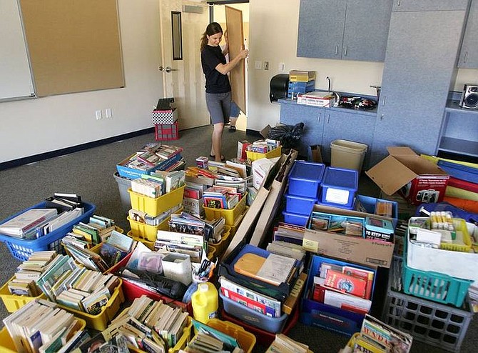 Cathleen Allison/Nevada AppealRiverview Elementary School fifth-grade teacher Stefanie Horn moves into her classroom this afternoon. Construction delays have postponed the opening of the new school until Sept. 4. More information coming in Friday&#039;s Nevada Appeal.