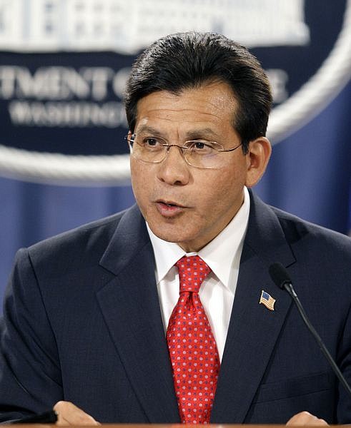 Attorney General Alberto Gonzales announces his resignation at a press conference at the Justice Department Headquarters, Monday, Aug. 27, 2007 in Washington. (AP Photo/Pablo Martinez Monsivais)