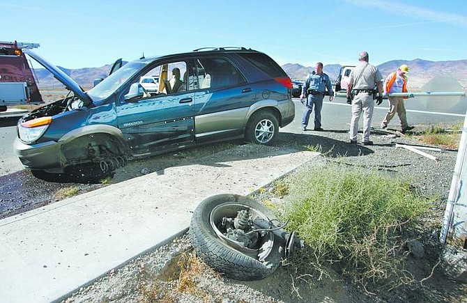 Cathleen Allison/Nevada AppealA Carson City man in his late 50s was taken to Carson Tahoe Regional Medical Center following a single car accident at Ambrose Lane and Highway 50 East on Thursday afternoon.