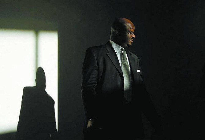 Brad Horn/Nevada Appeal Sen. Maurice Washington, R-Sparks, waits outside the Senate Ways and Means Committee chamber at the Legislature on June 5, 2005.