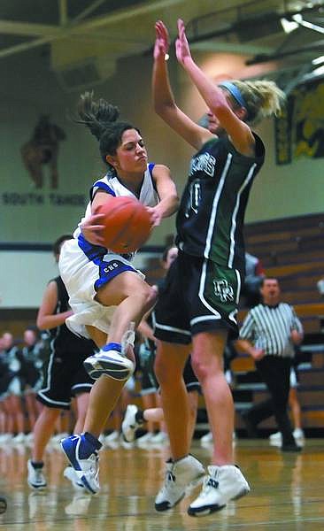 Chad Lundquist/Nevada Appeal Carson&#039;s (15) Kaitlin Burroughs drives past Damonte&#039;s (20) Colleen Carlson during Tuesday&#039;s game.