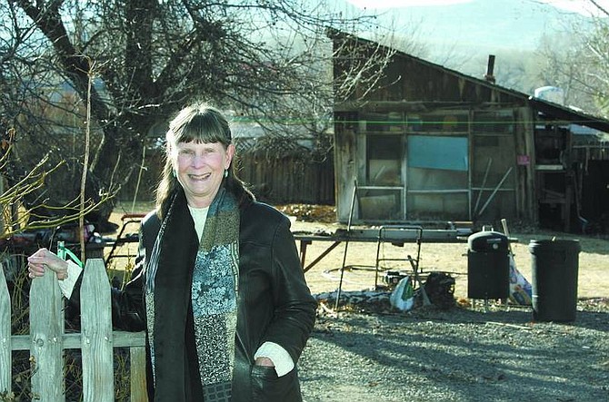 Cathleen Allison/Nevada Appeal Rosemary Brittain stands near the shed her stepfather Robert Caples once used as a studio in Dayton on Tuesday.