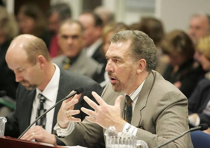 Carlos Brandenburg, Ph.D., right, administrator for the Division of Mental Health and Developmental Services, testifies at a Senate Finance and Assembly Ways and Means Joint Subcommittee on Human Services at the Nevada State Legislature on Thursday. Lawmakers told officials for Nevada&#039;s rural mental health clinics on Thursday to come up with a plan on how to recruit and retain workers after hearing the department has a 45 to 60 percent turnover rate.    Brad Horn/ Nevada Appeal