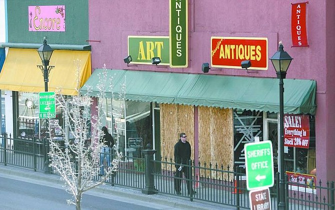 Local business owners are concerned about the negative impact the boarded-up windows may have on next week&#039;s  presidential candidate forum.   Cathleen  Allison/ Nevada Appeal