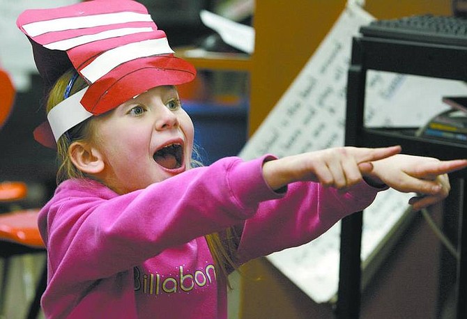 Cathleen Allison/Nevada Appeal Calli Hess, 6, reacts during a Dr. Seuss game with her first-grade class at Fremont Elementary School on Friday afternoon. Area students participated in Read Across America Day activities.