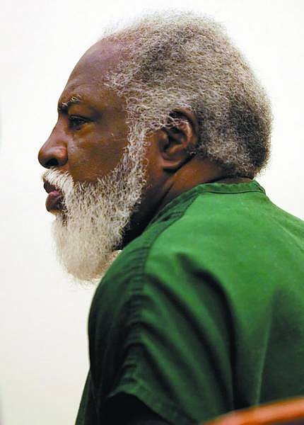 Chad Lundquist/Nevada Appeal A monthlong trial to begin April 3 was set Monday for David Winfield Mitchell, 61. He is charged with open murder in the 1982 killing of Sheila Jo Harris in Carson City. A citizen of Trinidad and Tobago in the West Indies, he was returned to the U.S. to face the charge in October.