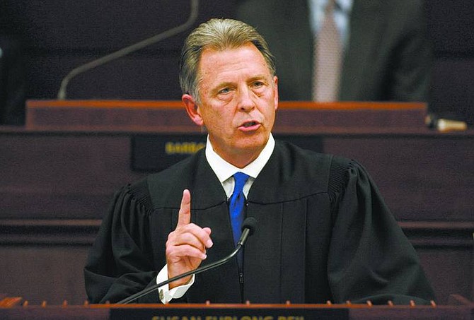 Cathleen Allison/Associate Press Nevada Supreme Court Chief Justice Bill Maupin addresses the Legislature on Wednesday night at the Legislature in Carson City.