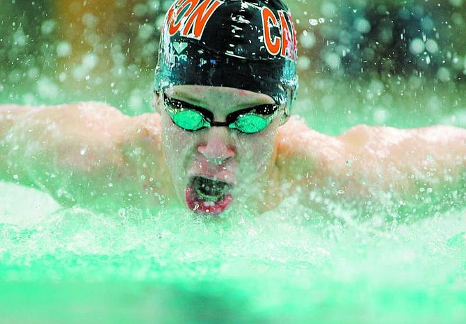 BRAD HORN/Nevada Appeal Carson&#039;s Jacob Cromwell, 14, competes in the butterfly leg of the medely on Saturday at Carson Aquatic Center.