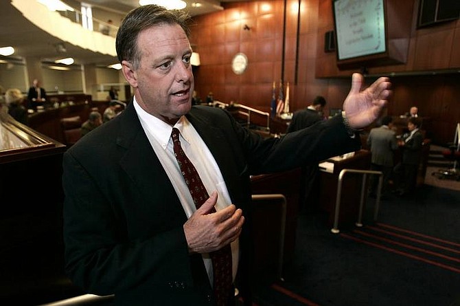 Cathleen Allison/Nevada Appeal Nevada Sen. John Lee, D-North Las Vegas, talks Wednesday in Senate chambers at the Legislature about his proposal that would allow Nevada to honor some out-of-state concealed-weapon permits.