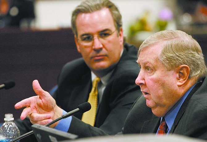 Cathleen Allison/Associated Press Donald Points, vice president of Acciona solar power, testifies before the Senate Commerce and Labor Committee Thursday. Greg Ferraro, with the Ferraro Group, is shown on the left.