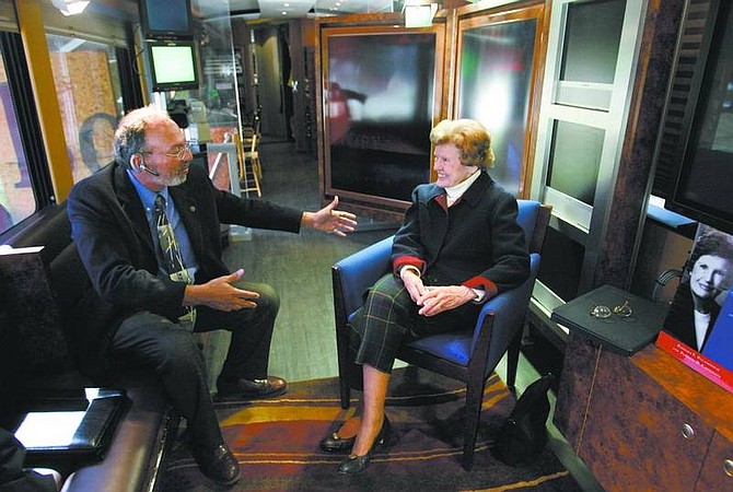 Cathleen Allison/Nevada Appeal George Jostlin, with Charter Communications, talks with former Congresswoman Barbara Vucanovich Friday on the Book TV bus in the Legislative Plaza. Vucanovich is one of 2,500 authors to be featured on the program this year.