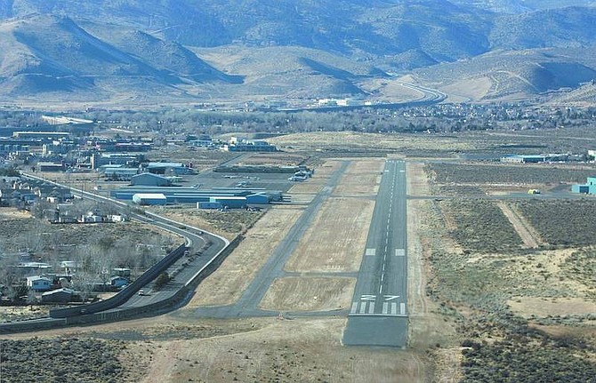 Cathleen Allison/Nevada Appeal Looking west on approach at the landing strip at the Carson City Airport, as seen from the air. The airport&#039;s master plan calls for realigning the runway more to the north, so aircraft fly over the Empire Ranch Golf Course instead of homes.