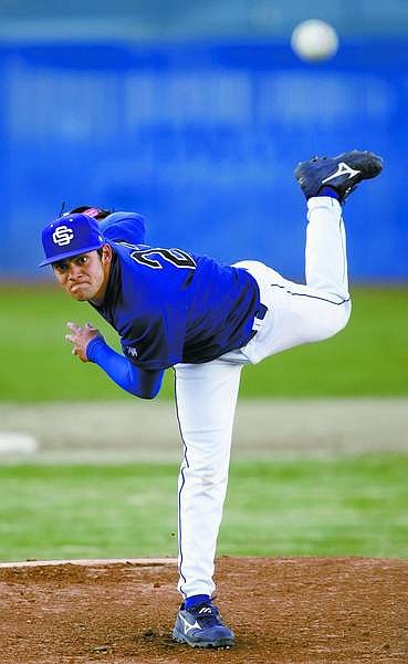 Chad Lundquist/Nevada Appeal Carson&#039;s Steven Sawyers brings the heat during Tuesdays game against Reno&#039;s McQueen.