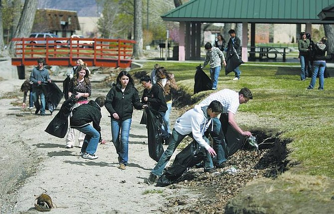 Cathleen Allison/Nevada Appeal About two dozen Carson High School leadership students picked up trash at Mills Park on Tuesday afternoon as a community service project.