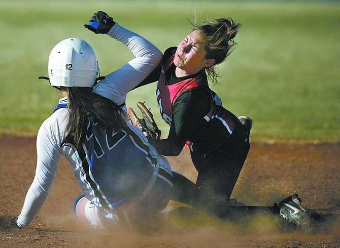 Cathleen Allison/Nevada AppealCarson&#039;s Daria Leid collides with Wooster shortstop Melanie Pfieffer on a steal attempt in Thursday&#039;s game at CHS. Leid was out on the play, but Carson won 11-2.