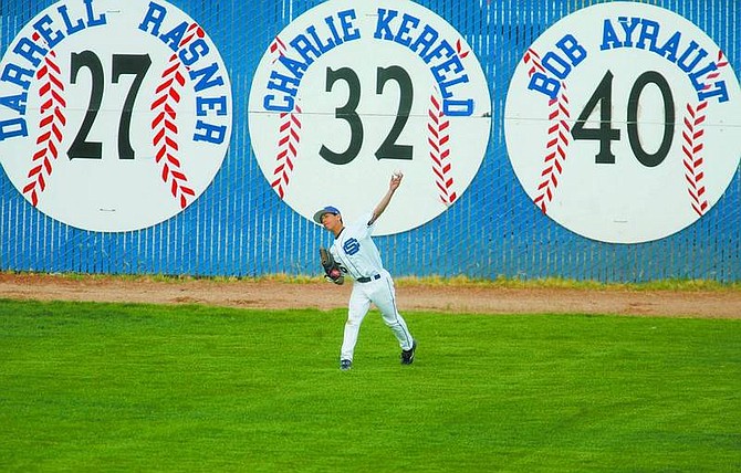 BRAD HORN/Nevada Appeal Carson&#039;s Drew Good throws into the infield after making a catch in the Senator&#039;s game against the Reno Huskies in Carson on Saturday.