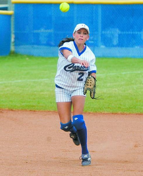 BRAD HORN/Nevada Appeal Carson&#039;s Crista Casci throws a Reno runner out at first base during the second game of their doubleheader in Carson on Saturday.