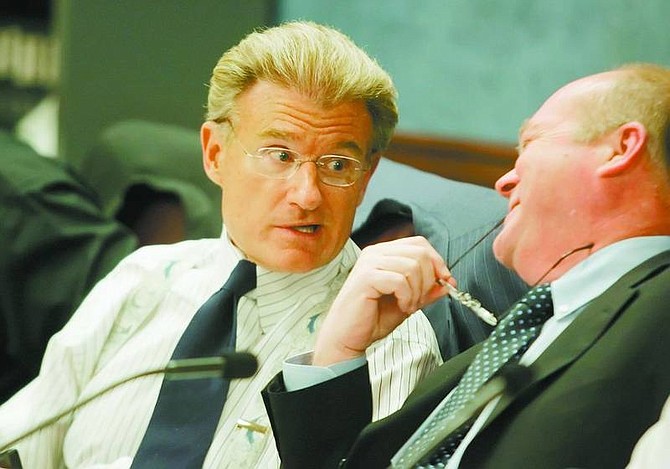 Brad Horn/Nevada Appeal Sen. Randolph Townsend, R-Reno, speaks to Sen. Bob Beers, R-Las Vegas, during a Senate Government Affairs work session at the Nevada State Legislature on Friday.