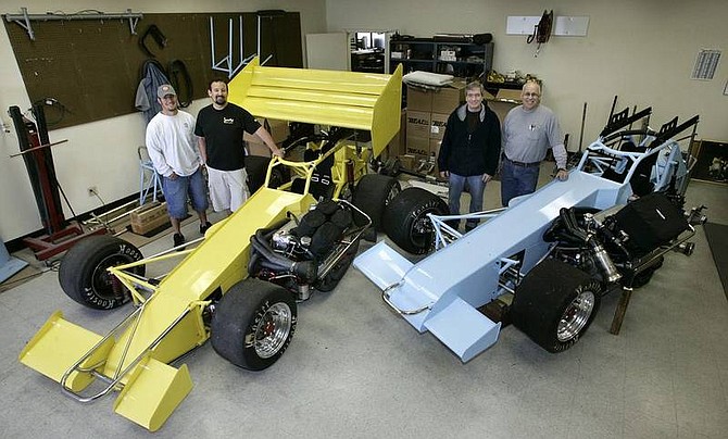 Cathleen Allison/Nevada Appeal From left, Branden and Dale Lamborn (driver) of Dangerzone Motorsports, and Tom Silsby and Steve Shaw, co-owners of S&amp;S Motorsports, are two of the five Northern Nevada teams in the American Speed Association/Western States Supermodified Racing League series. The teams open their racing season April 28 at Madera Speedway, Madera, Calif.