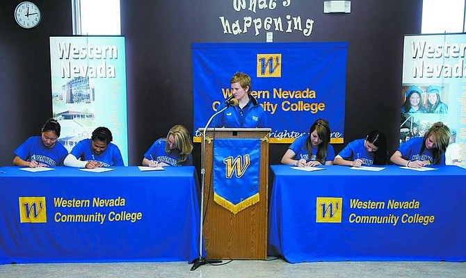 Chad Lundquist/Nevada Appeal Ashley Winters, Patty Montoya, Jessi Chittwood, Cassie Romero, Sam Perry and Rachel Von Roy, sign their letters of intent to play for Western Nevada Wildcats soccer team on Tuesday.