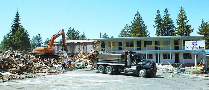 Jim Grant/Nevada Appeal News Service The Knights Inn in South Lake Tahoe is torn down on Monday as demolition of properties in the 12-acre convention center site continues just across the state line.