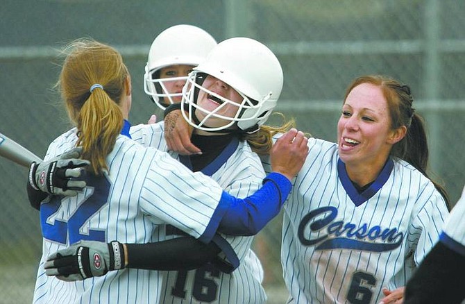 Cathleen Allison/Nevada Appeal Carson&#039;s Niki Keller gets congratulated by her teammates after hitting a two-run homer in the fourth inning of Thursday&#039;s 12-2 victory over Damonte Ranch at CHS.